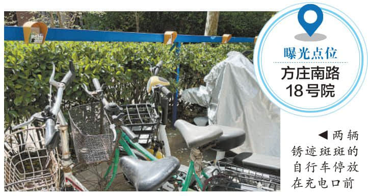 充電樁富余卻依然搶不上 誰來管堵路占位“僵尸車”